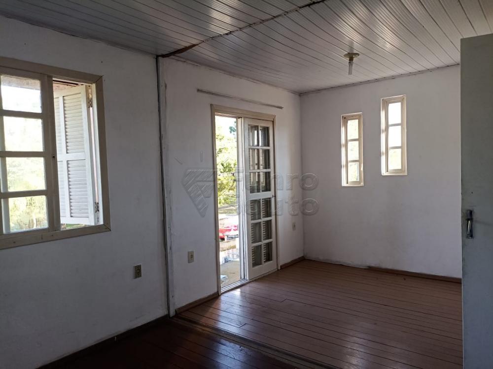 Comprar Casa / Padrão em Pelotas R$ 280.000,00 - Foto 1