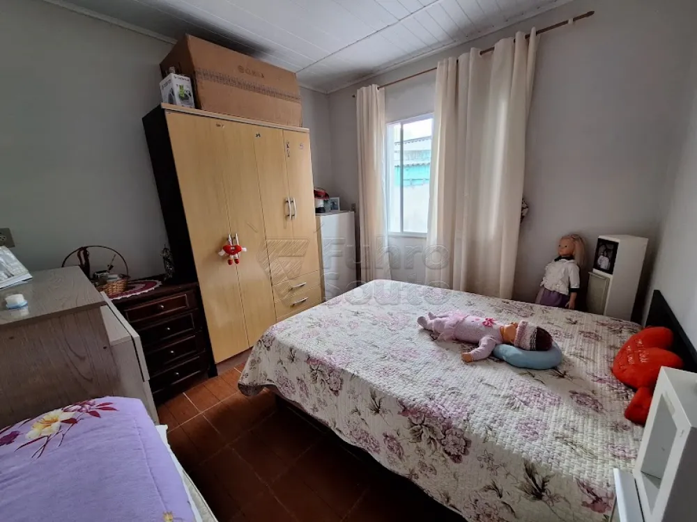 Comprar Casa / Padrão em Pelotas R$ 424.000,00 - Foto 6