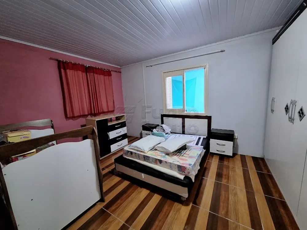 Comprar Casa / Padrão em Pelotas R$ 424.000,00 - Foto 8