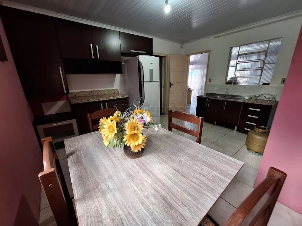 Comprar Casa / Padrão em Pelotas R$ 424.000,00 - Foto 11