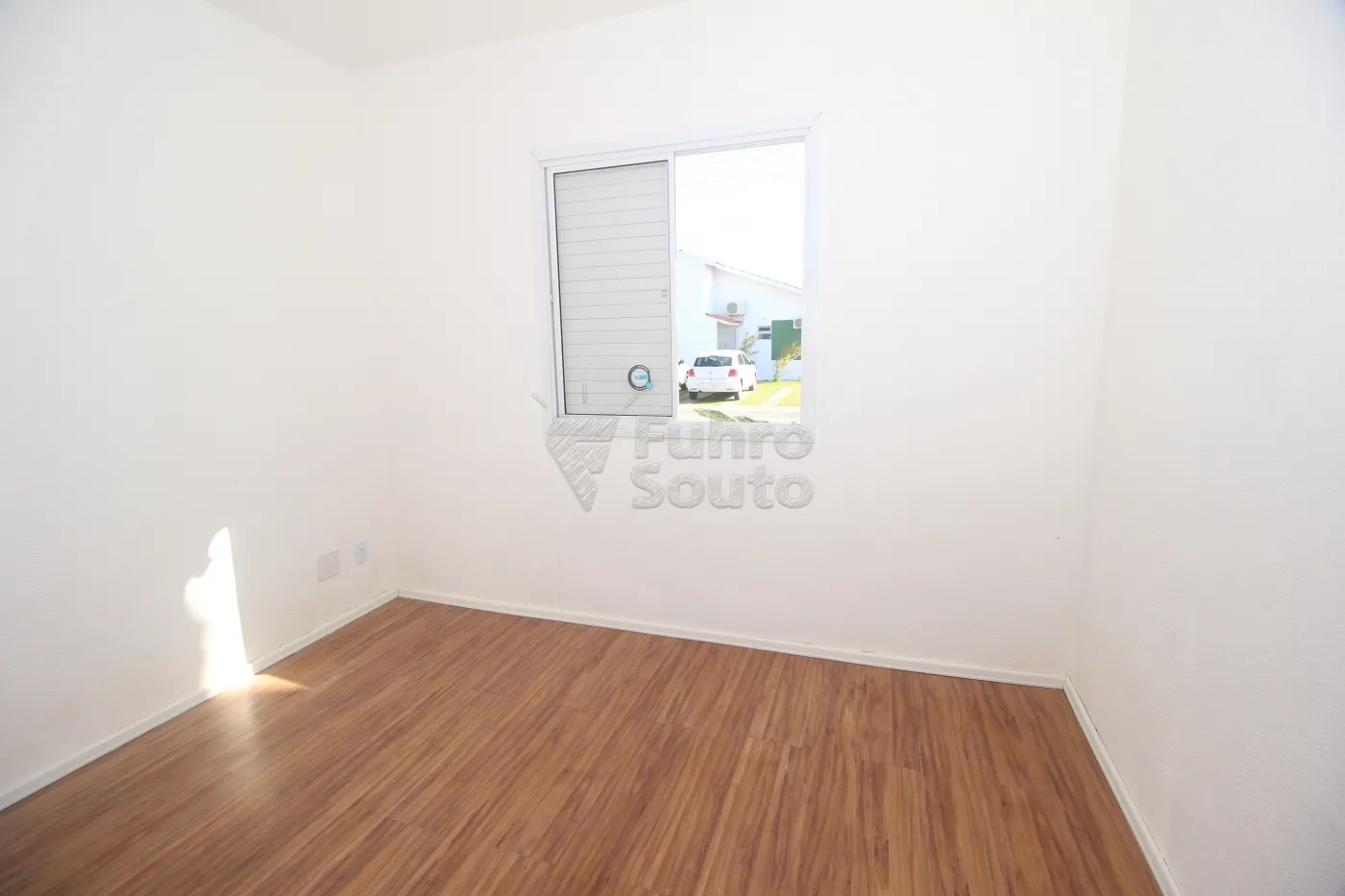 Alugar Casa / Condomínio em Pelotas R$ 1.200,00 - Foto 5