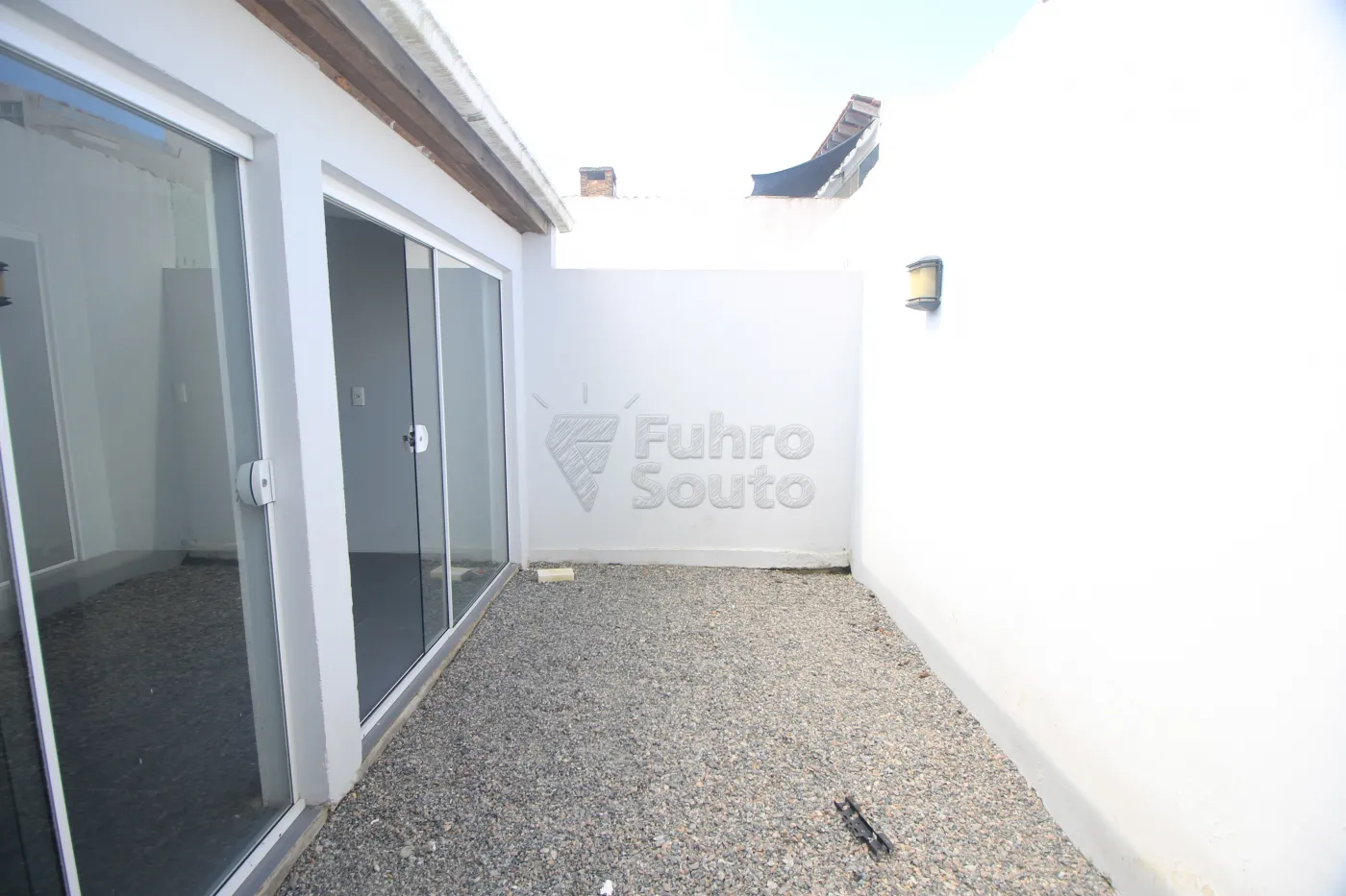 Alugar Casa / Condomínio em Pelotas R$ 1.500,00 - Foto 22