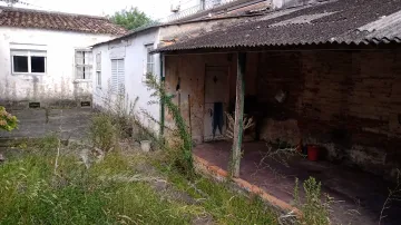 Terreno no Centro com Casa a Ser Demolida